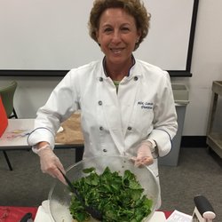 Alix Landman, MPH, RD - Making a Kale salad for Employees at Palm Beach County Clerk Worksite Wellness Series