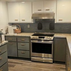 Pacific Kitchens Inc - Cabinet Refacing in "High Gloss White" and "Gauntlet Grey", Thermofoil blends well with new Quartz countertops and tile splash.
