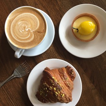 Petit Pierre Bakery - Latte, lemon tart, strawberry pistachio croissant - Bakeries Near Me - Seattle, Washington