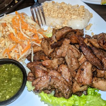 Asian Bowl - #43 Grilled pork neck/shoulder w.papaya salad and sticky rice. Excellent dish! $19.99 - Asian Fusion Near Me - Forest Hills, New York