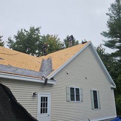 Titan Roofing and Exteriors - Shingles have been removed from this home in Manchester, NH.