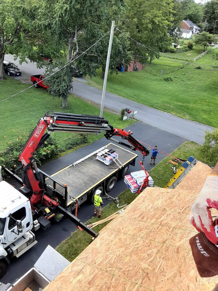 Slide of C & J Roofing