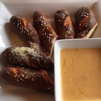 Pub 235 - German pretzel sticks with a beer cheese sauce - Pubs Near Me - Webster, New York Pub 235 - German pretzel sticks with a beer cheese sauce - Pubs Near Me - Webster, New York