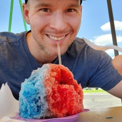 Hokulia Shave Ice - Blue raspberry, tiger blood, and black cherry with coconut ice cream inside!
