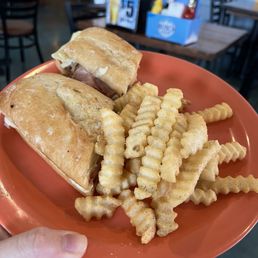 The Cuban sandwich with a side of fries. The Cuban sandwich with a side of fries.