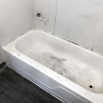 Glazed Tub - Pre-refinishing condition showing buildup, discoloration, and aging tub surface. - Refinishing Services Near Me - Mickleton, New Jersey Glazed Tub - Pre-refinishing condition showing buildup, discoloration, and aging tub surface. - Refinishing Services Near Me - Mickleton, New Jersey