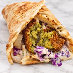 ZamZamz Mediterranean Grill - Falafel Wrap -- A flavorful vegetarian Mediterranean wrap with crispy falafel in warm pita.