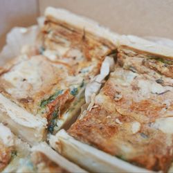Banyan Kitchen & Cafe - Spinach, Tomato, Feta, & Swiss Quiche. Crust was flakey & buttery. Filling was custardy, with spinach & roasted tomatoes, Swiss & feta.