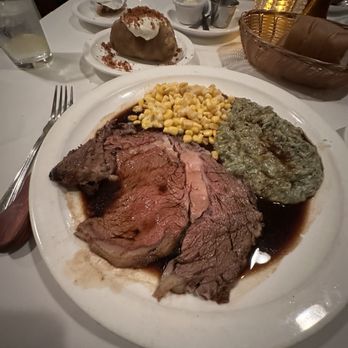 Broadway Prime - Prime Rib with Creamed Spinach and corn. Loaded baked potato on the side - Steakhouses Near Me - Burlingame, California