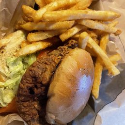 Chicken fried steak sandwich with fries Chicken fried steak sandwich with fries