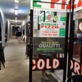 Oceanside Pizza - a storefront with signs for sale - Pizza Near Me - Melbourne Beach, Florida