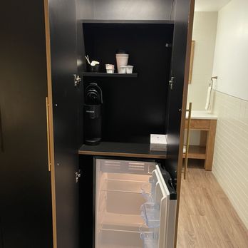Angoria Hotel - Coffee with pods and cups. Refrigerator. - Hotels Near Me - San Angelo, Texas Angoria Hotel - Coffee with pods and cups. Refrigerator. - Hotels Near Me - San Angelo, Texas