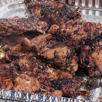 Jerk Wings Cafe - And there they are, jerk chicken wings, just the right amount of heat and oh so delicious! - Caribbean Near Me - Los Angeles, California