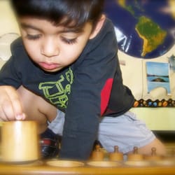 This child is practicing with his knobless cylinders, preparing himself for the pencil grip skills