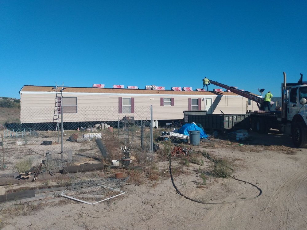 Slide of Outlaw Roofing