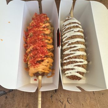Two Hands Hotdog - (Left)Potato Dog -(With hot Cheetos dust ) (Right) Two Hands Dog-(with ranch on top) - Hot Dogs Near Me - Los Angeles, California Two Hands Hotdog - (Left)Potato Dog -(With hot Cheetos dust ) (Right) Two Hands Dog-(with ranch on top) - Hot Dogs Near Me - Los Angeles, California