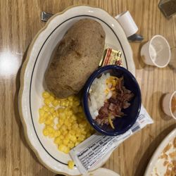 Goody's Grille - Loaded baked, corn, and dinner roll already eaten.