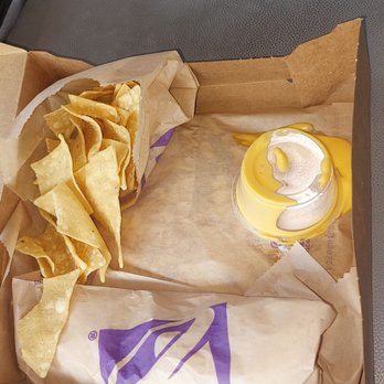 Taco Bell - Nachos cheese sauce upside-down with no lid. - Fast Food Near Me - Belleville, Illinois Taco Bell - Nachos cheese sauce upside-down with no lid. - Fast Food Near Me - Belleville, Illinois