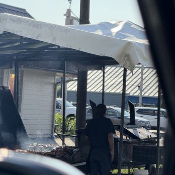 Sol De Dia - Guy grilling with no gloves - Mexican Near Me - Manassas, Virginia Sol De Dia - Guy grilling with no gloves - Mexican Near Me - Manassas, Virginia