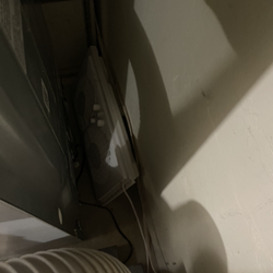 Fan blowing over coils, see description in body