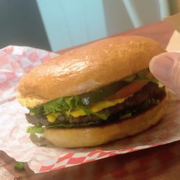 The hamburger put together with lettuce and tomato... The hamburger put together with lettuce and tomato...