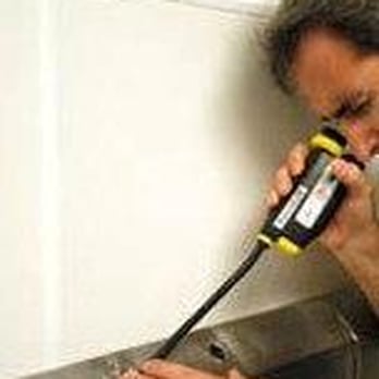 American Mold Experts MidWest - Looking in inaccessible areas for mold growth using a bore-scope. We drill a small inconspicuous hole and look under cabinets... - Environmental Testing Near Me - Plainfield, Indiana
