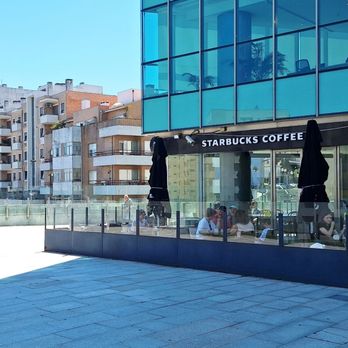 Starbucks - This is the outdoor seating at this Starbucks on the ground level of El Corte Ingles in Vila Nova de Gaia. - Cafes Near Me - Vila Nova de Gaia, 13