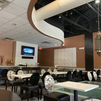Mazadar Restaurant - Interior, love the fountain and the comfortable cushions. - Afghan Near Me - Fairfax, Virginia Mazadar Restaurant - Interior, love the fountain and the comfortable cushions. - Afghan Near Me - Fairfax, Virginia
