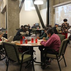 Center for Elders' Independence - Seniors gather together in the day center for meals and activities and to be social with each other.