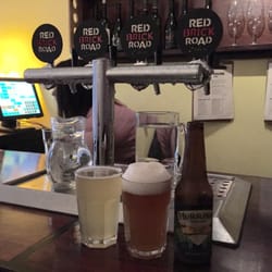 Red Brick Road Cider House - Drinks in front of the tap at Red Brick Road Ciderhouse.