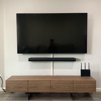Installationpro - 75" TV mounted along with a Sonos soundbar. He was able to hide the wires very nicely. - Handyman Near Me - Irvine, California