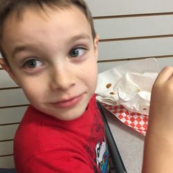 Handy Mart - My son, enjoying his lunch.