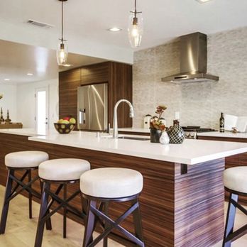 Lianoz Construction - a kitchen island with stools - General Contractors Near Me Lianoz Construction - a kitchen island with stools - General Contractors Near Me