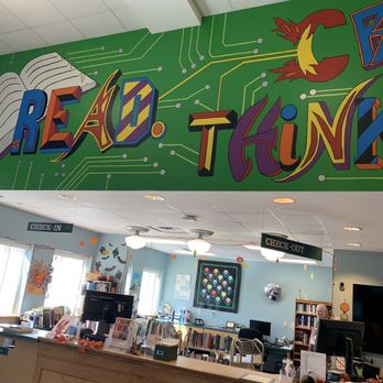 Putnam County Public Library - Front desk with colorful mural - Libraries Near Me - Greencastle, Indiana Putnam County Public Library - Front desk with colorful mural - Libraries Near Me - Greencastle, Indiana