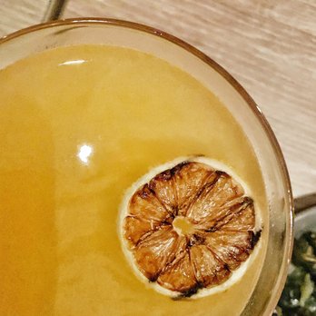 Margot - The cure - apparently it's a new drink on the menú! Basically a gin penicillin. Really good and tasty! - Spanish Near Me - Culver City, California
