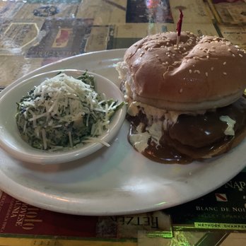 The Blue Monkey - Chicken fried steak burger with creamed spinach - Bars Near Me - Memphis, Tennessee
