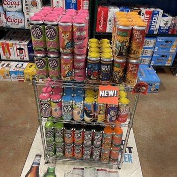 Chevron - a display of cans of soda and other beverages - Gas Stations Near Me - Los Angeles, California Chevron - a display of cans of soda and other beverages - Gas Stations Near Me - Los Angeles, California