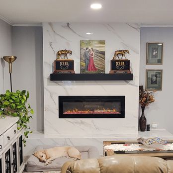 SDG Home Concepts - a living room with a fireplace - General Contractors Near Me - Aubrey , Texas