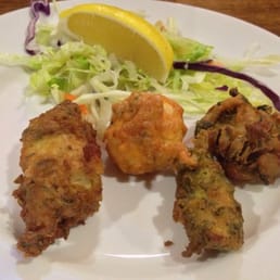 Selection of pakora - chicken, mushroom, vegetable & fish Selection of pakora - chicken, mushroom, vegetable & fish