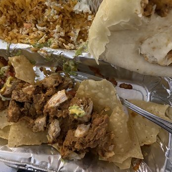 Chuy's - 6-7 pieces of tiny pieces of chicken but no white jalapeño sauce. Tasteless. Huge doughy tortilla. - Tex-Mex Near Me - Jacksonville, Florida