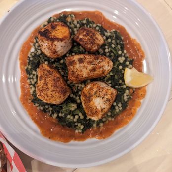 Tidewater Oyster Bar - Wahoo fish with spinach and couscous - Seafood Near Me - Wilmington, North Carolina Tidewater Oyster Bar - Wahoo fish with spinach and couscous - Seafood Near Me - Wilmington, North Carolina