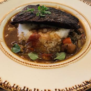 Kindling Texas Kitchen - Blackened Red Fish over Gumbo! - American Near Me - Cibolo, Texas