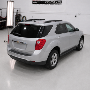 Hail Solutions - This 2015 Chevy Equinox received professional hail dent removal from Hail Solutions in Overland Park, KS - Body Shops Near Me - Olathe, Kansas