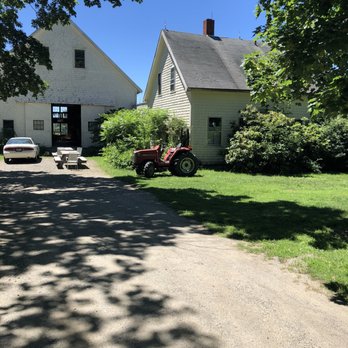 Oyster River Winegrowers - a farm house and tractor - Wine Tasting Room Near Me - Warren, Maine