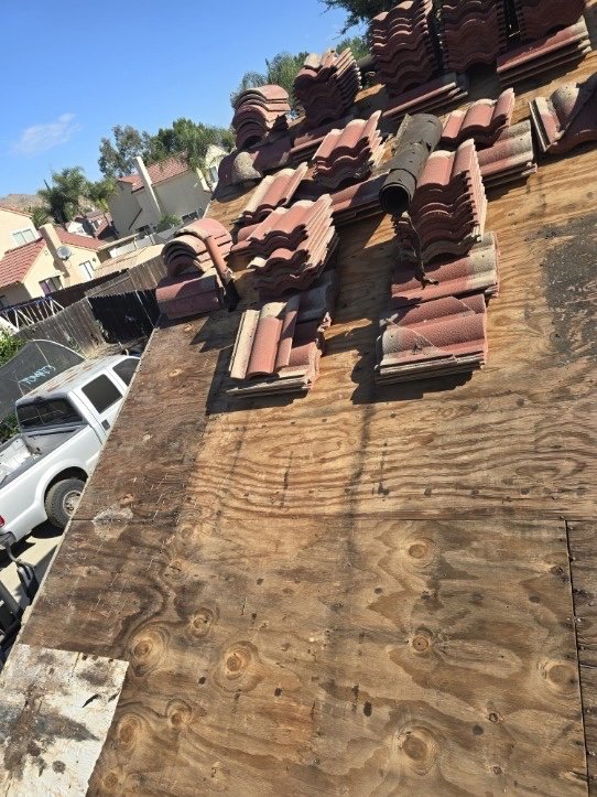 Slide of Richy’s Roofing Repair