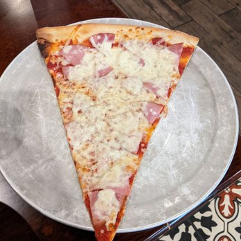 Vintage Pizzeria - Canadian bacon pizza slice. - Pizza Near Me - Dunwoody, Georgia Vintage Pizzeria - Canadian bacon pizza slice. - Pizza Near Me - Dunwoody, Georgia