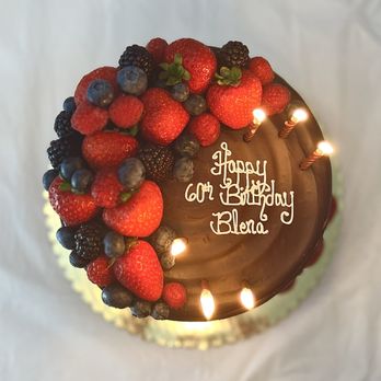 Schat's Bakeries & Cafes - Triple layer, semi-naked chocolate cake with chocolate ganache drip, chocolate fudge layers and berry assortment. - Bakeries Near Me - Ukiah, California