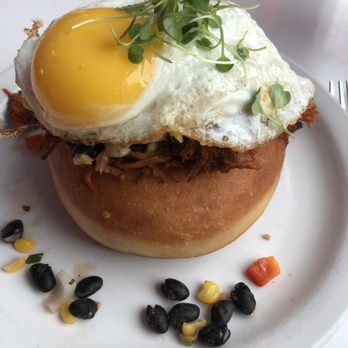 Hi-Lo Diner - Notorious P.I.G.* BBQ pork, black bean corn salsa, and sunny side up egg on a donut w a little syrup. The egg yolk made it. - Diners Near Me - Minneapolis, Minnesota