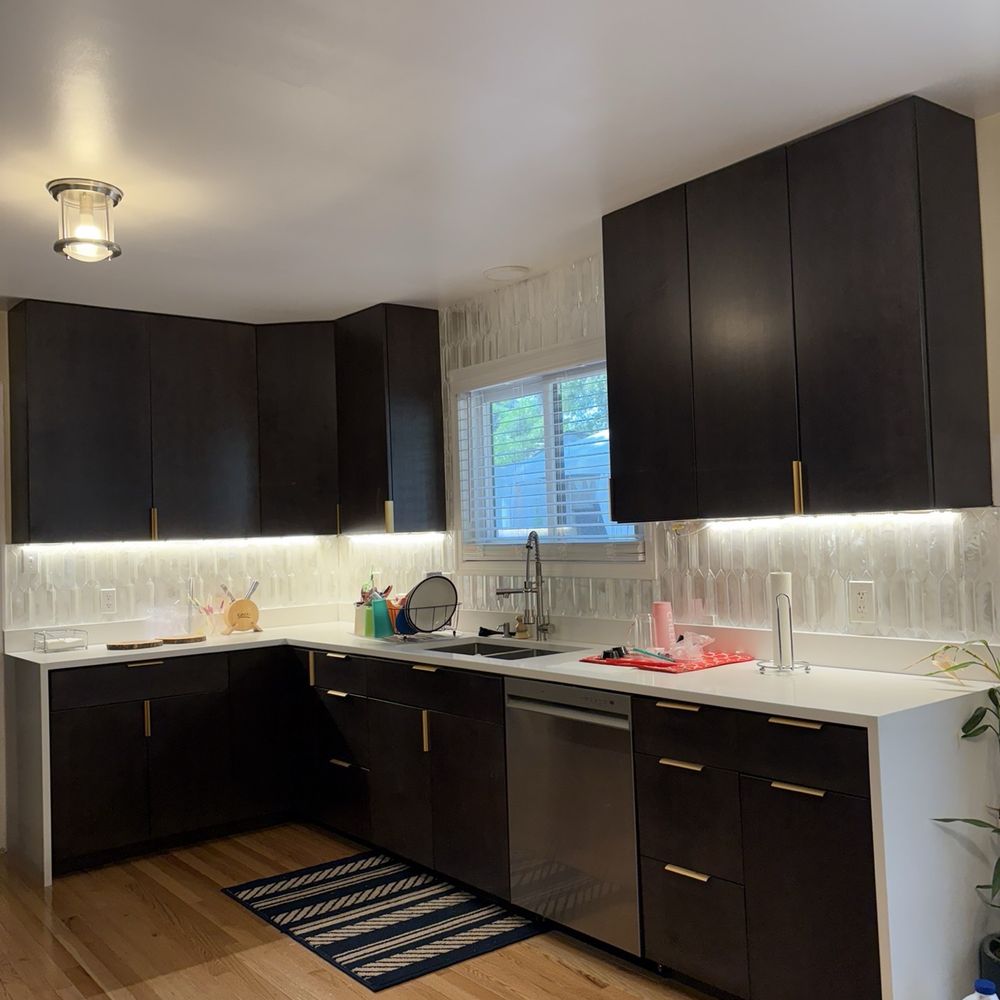 European Granite Design - Counter on sink wall with water wall edges. - General Contractors Near Me - Clinton, Maryland