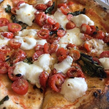 Pupatella - burata with roma tomatoes, basil and pine nuts. no sauce - Pizza Near Me - Arlington, Virginia Pupatella - burata with roma tomatoes, basil and pine nuts. no sauce - Pizza Near Me - Arlington, Virginia